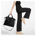STATUS ANXIETY COMES IN WAVES BAG BLACK
