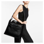 STATUS ANXIETY COMES IN WAVES BAG BLACK