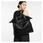 STATUS ANXIETY COMES IN WAVES BAG BLACK